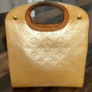 LOUIS VUITTON Gold Tote with Iconic Embossed Design